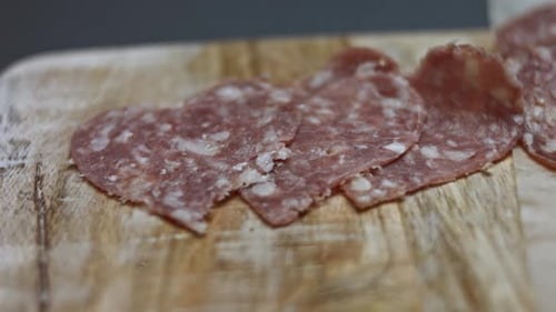 Heart-Shaped Salami on Wooden Cutting Board Close-Up