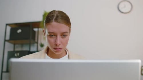Businesswoman Girl Freelancer at Office Workplace Working on Laptop Computer Sends Online Messages