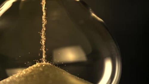 Super Slow Motion Sand Fall in the Hourglass Filmed on a Highspeed Camera at 1000 Fps