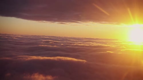 Beautiful sunrise above the clouds