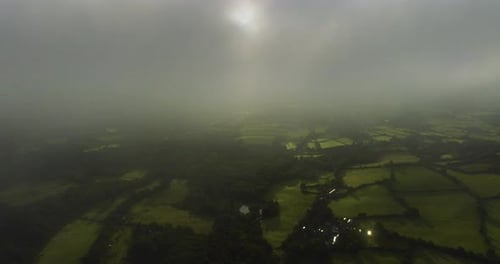 Mist And Cloud Covering English Farmland Aerial View
