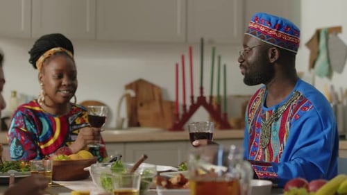 Family Celebration with Meal and Traditional Clothing