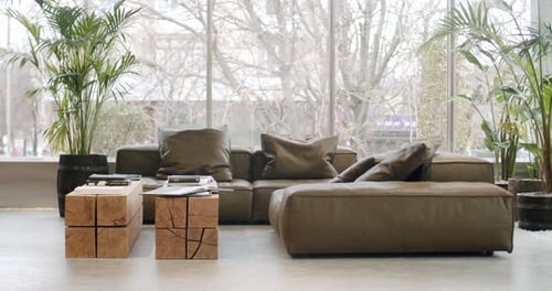 Modern Interior Design: Stylish Couch and Wood Tables