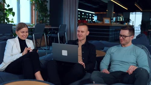 Team Collaboration in Modern Office Lounge