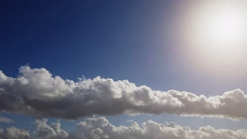 White Clouds Float in Blue Sky