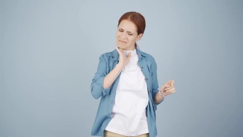 Woman Experiencing Throat Discomfort, Sore Throat, Medical
