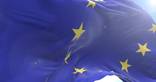Realistic European Union Flag Waving Against Blue Sky