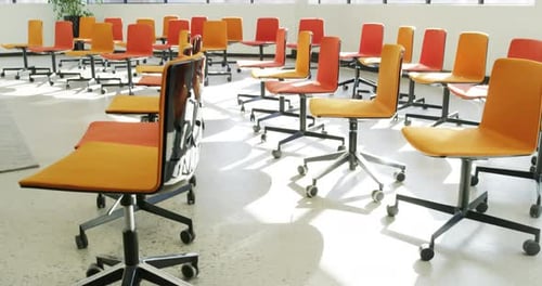 Empty, conference room and chairs in workplace with furniture for business, career and workspace