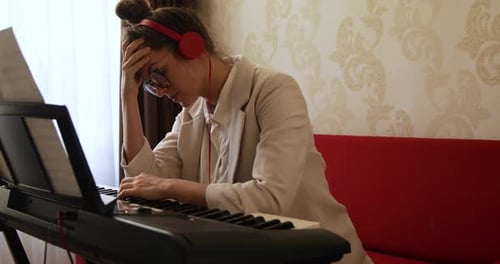 Woman Composer Has Creative Burnout During a Music Writing at Home