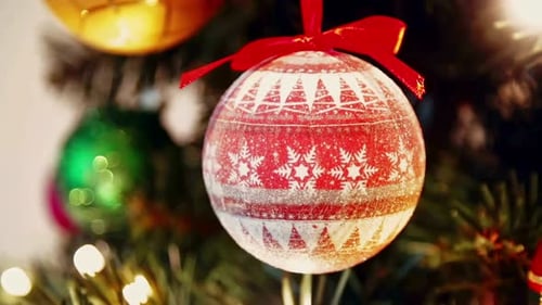 Red and White Christmas Ornament Hanging on Tree
