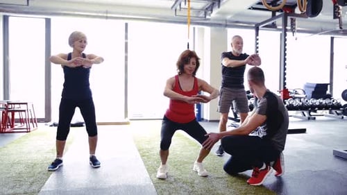 Pair of Kettlebells Laid on the Floor in Gym Activity