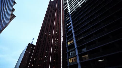 Ethereal Giants A Mesmerizing Encounter Between Two Towering Skyscrapers