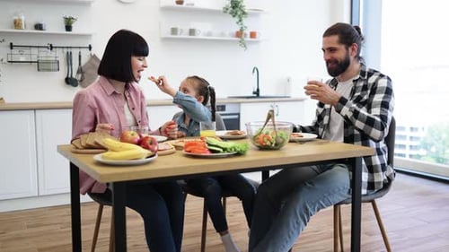 Family Enjoying Meal Together at Home