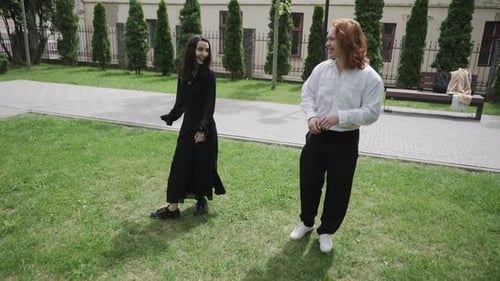 Young Adults Dancing Together in an Urban Park