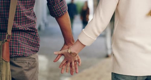 4k footage of two college students walking hand in hand