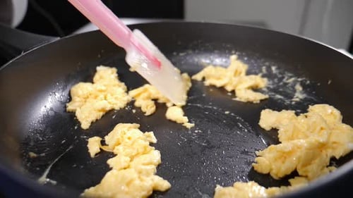Cooking Scrambled Eggs in a Pan with Spatula