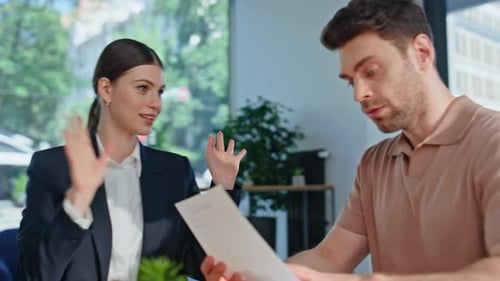 Financial Advisor Consulting Client in Corporate Office Closeup Woman Talking