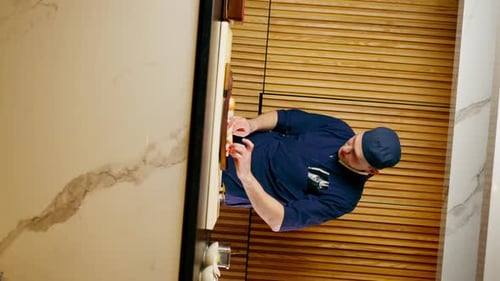 Vertical Video in Japanese Restaurant the Chef Lays Out Pieces of Raw Fish on a Long Red Plate