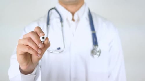 Doctor Writes the Word Depression on Glass