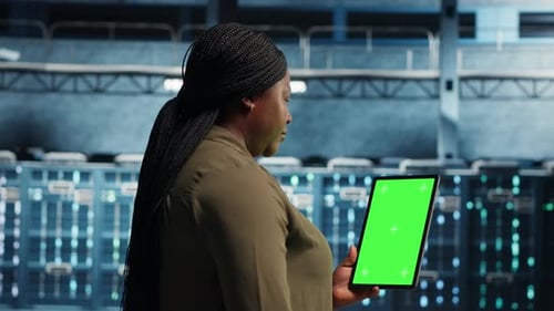Hightech Data Center Green Screen Laptop Prepared for Equipment Checkups
