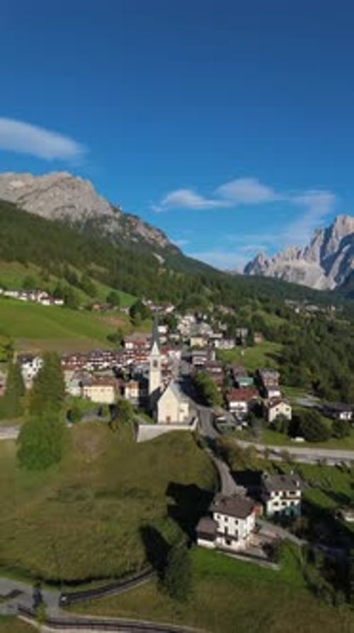 Scenic View of Rocca Pietore Village and Dolomites
