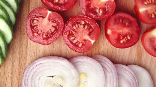 Vegetables Slice Fresh Salad Cooking Ingredient on Wooden Board Closeup Top View Tracking Shot