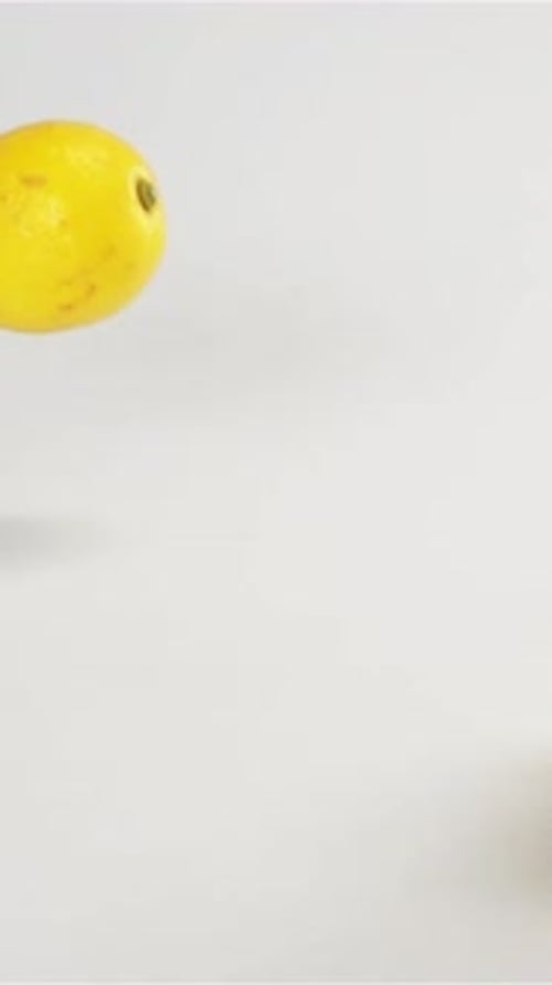 Floating Lemons on White Background