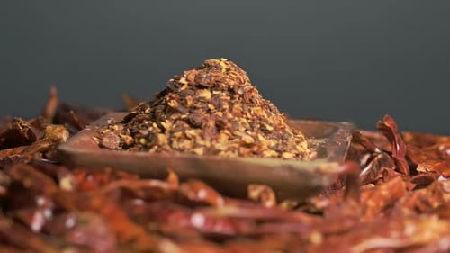 Crushed Red Pepper Pile in a Wooden Dish