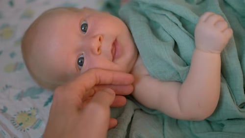 Adorable Infant Lying Down at Home