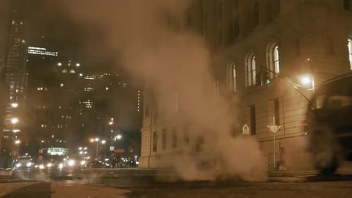 An Urban Nightscape Featuring Steam and Vibrant City Lights in a Dynamic Atmosphere