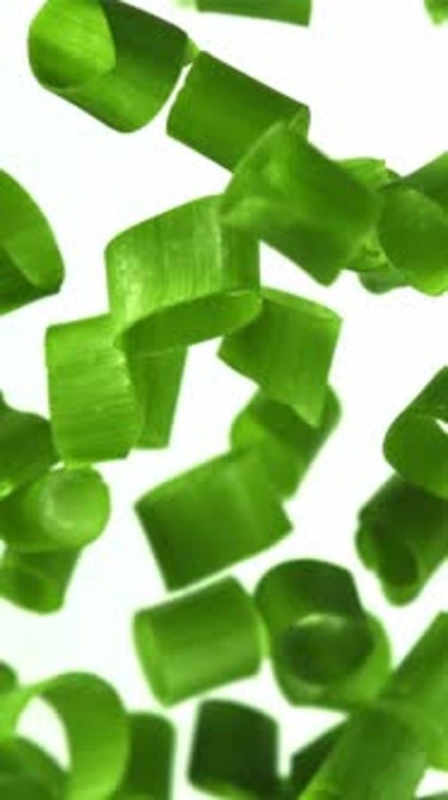 Sliced Green Onions Fly Up and Fall Down Filmed on a Highspeed Camera at 1000 Fps