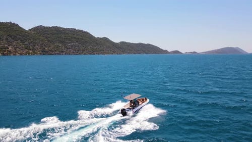 Beautiful view of the beach with boats, pure nature, sea and ships. Shot from a drone.