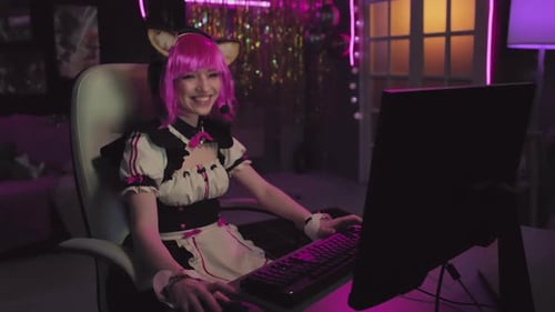 Young Cosplayer Playing Video Game During Live Stream