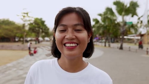 Smiling Woman Portrait on Tropical Beach