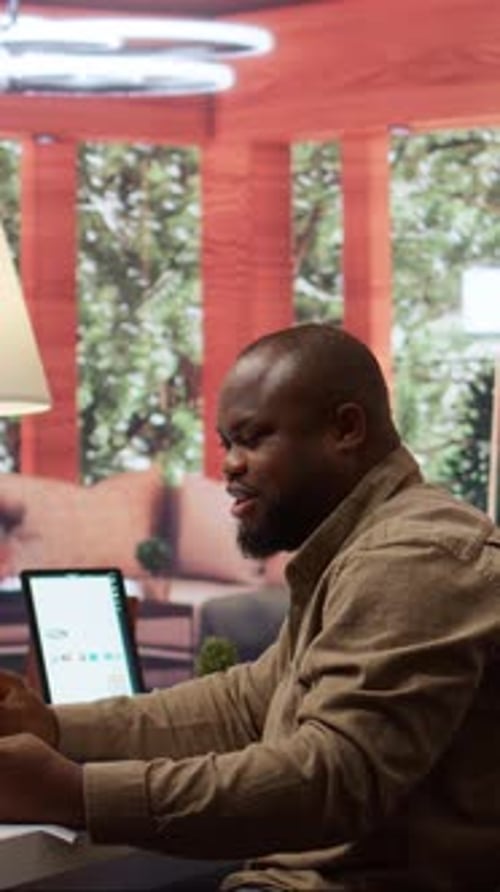 Vertical Video Startup Entrepreneur Calculating the Annual Sales Reports to Review the Budget