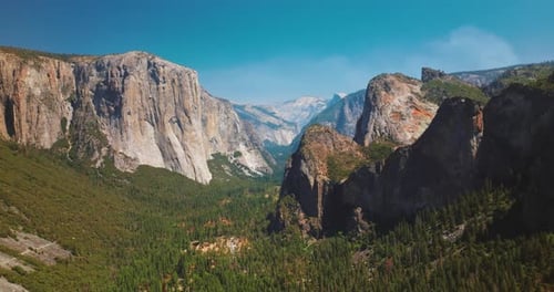 Mountain California landscapes. Aerial view of forest and river in Yosemite National Park.