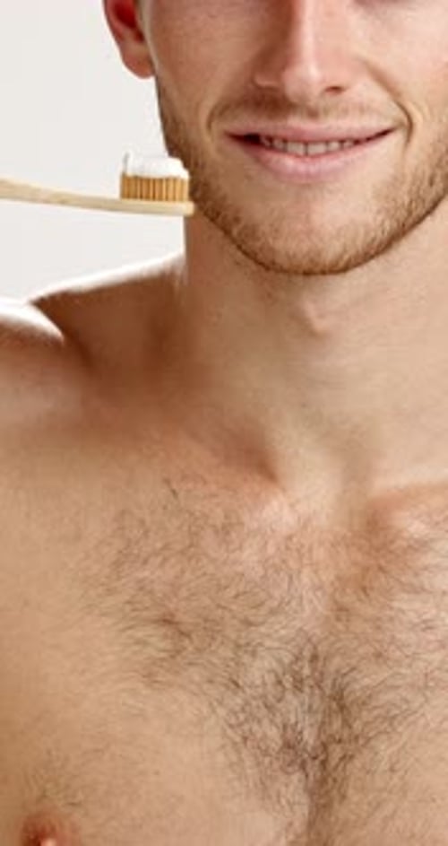 Mouth, hygiene and man with toothbrush, studio or smile for grooming, morning routine