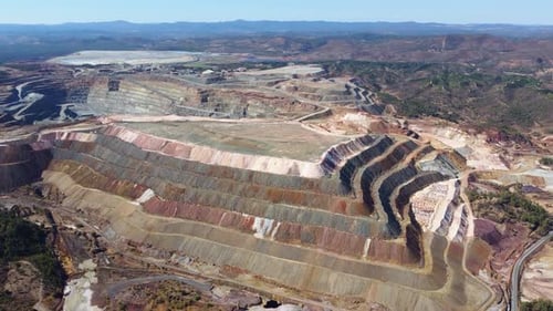 Aerial drone view of Mining activity. Apocalypse scenery. Earth destruction. Disruption of nature.
