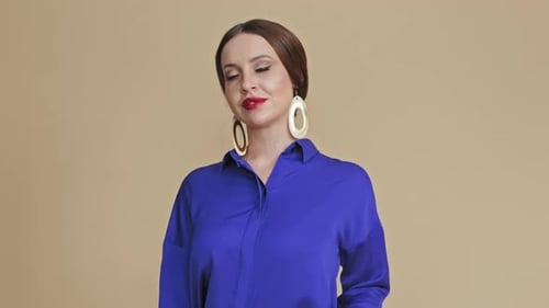 Beautiful Model Posing on Camera in Studio