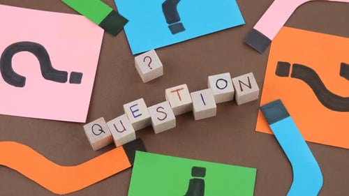 Question Blocks with Colorful Paper Cutouts Design