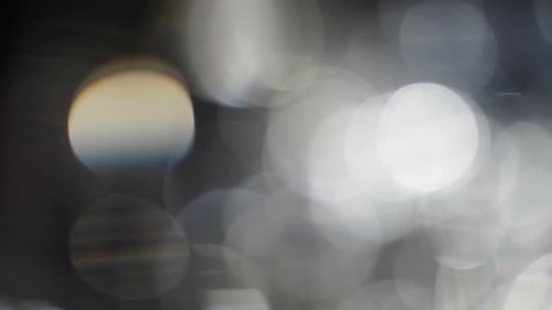 Abstract Sparkling White and Gold Bokeh Lights