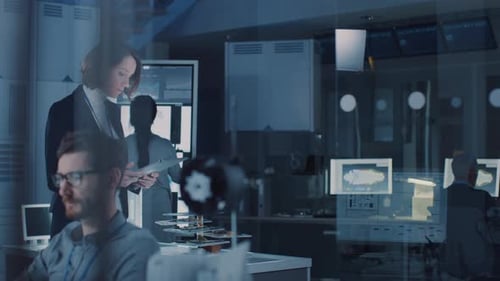 Tech Team Working in High-Tech Research Laboratory