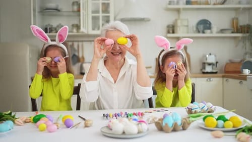 Happy Easter Two Little Girls Sisters Twins Grandmother Painting Eggs Enjoying Time Together Happy