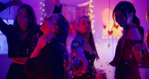 Friends Dancing at a Birthday Party at Home