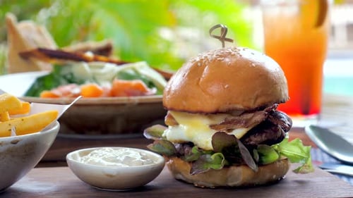 Fast Food Burger with a Juicy Beef Patty Melted Cheese Served at an Outdoor Restaurant