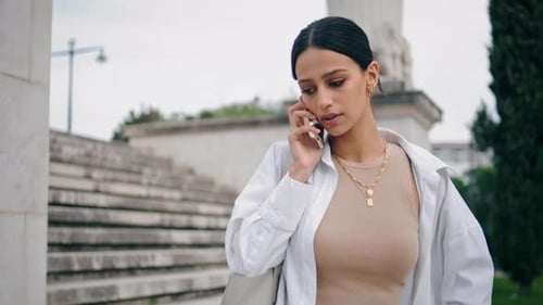 Waiting Woman Calling Phone At Architecture Place. Close Up Displeased Lady Making Smartphone Cal...