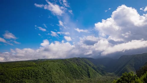 Timelapse - Beautiful clouds over the valley of the mountain range