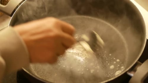 Melting Cream in a Grey Cooking Pan