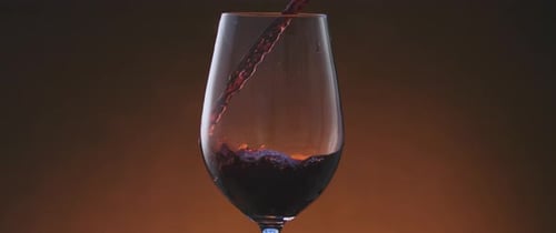 Pouring Red Wine Into a Glass, Close Up