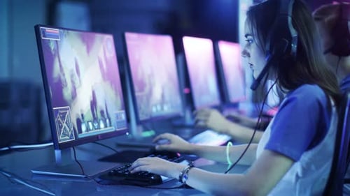 Woman Gamer Playing Online Game in Esports Arena